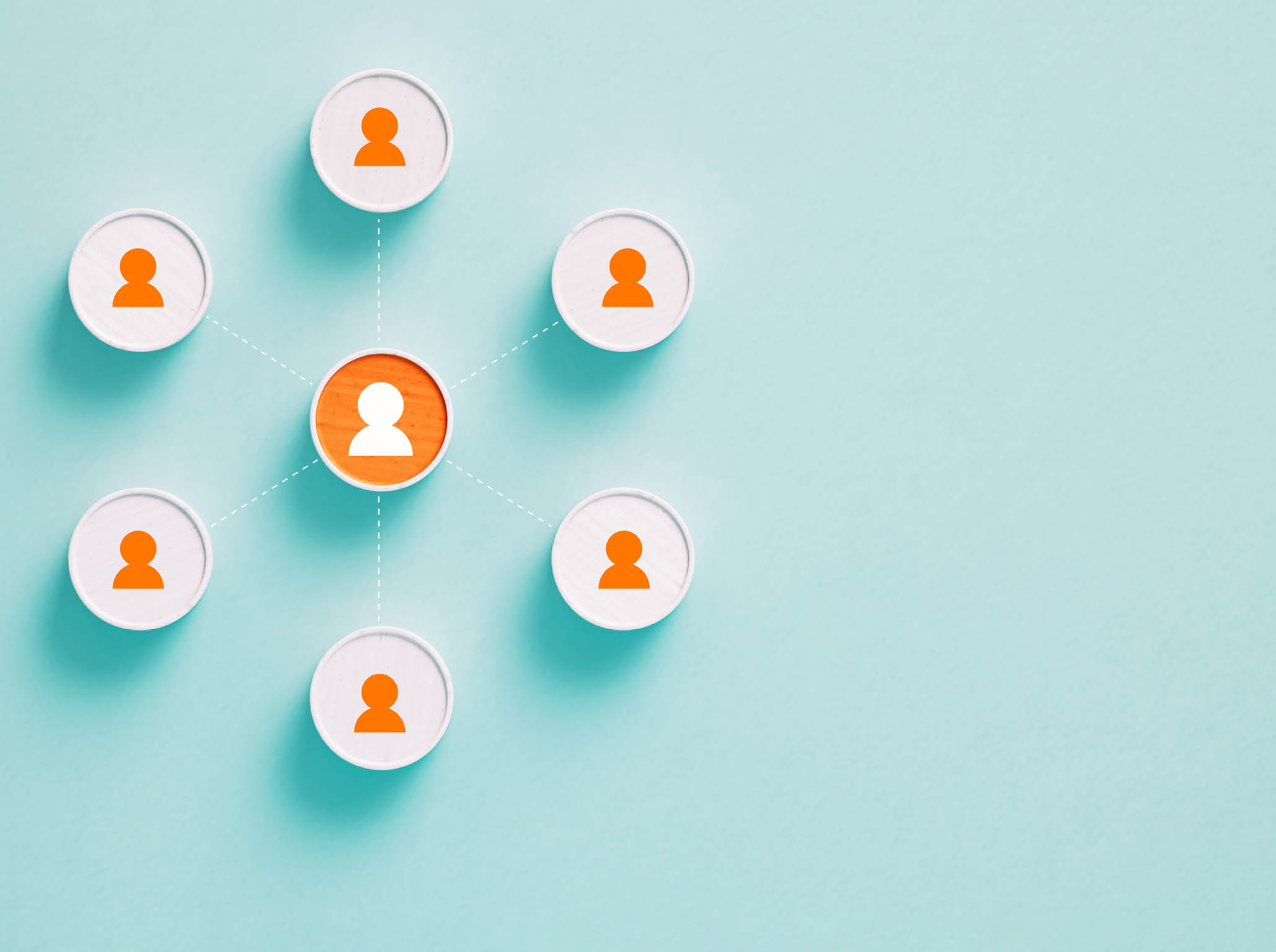 Cylinder objects with human symbols on blue background. One of the objects is orange colored. Horizontal composition with copy space.